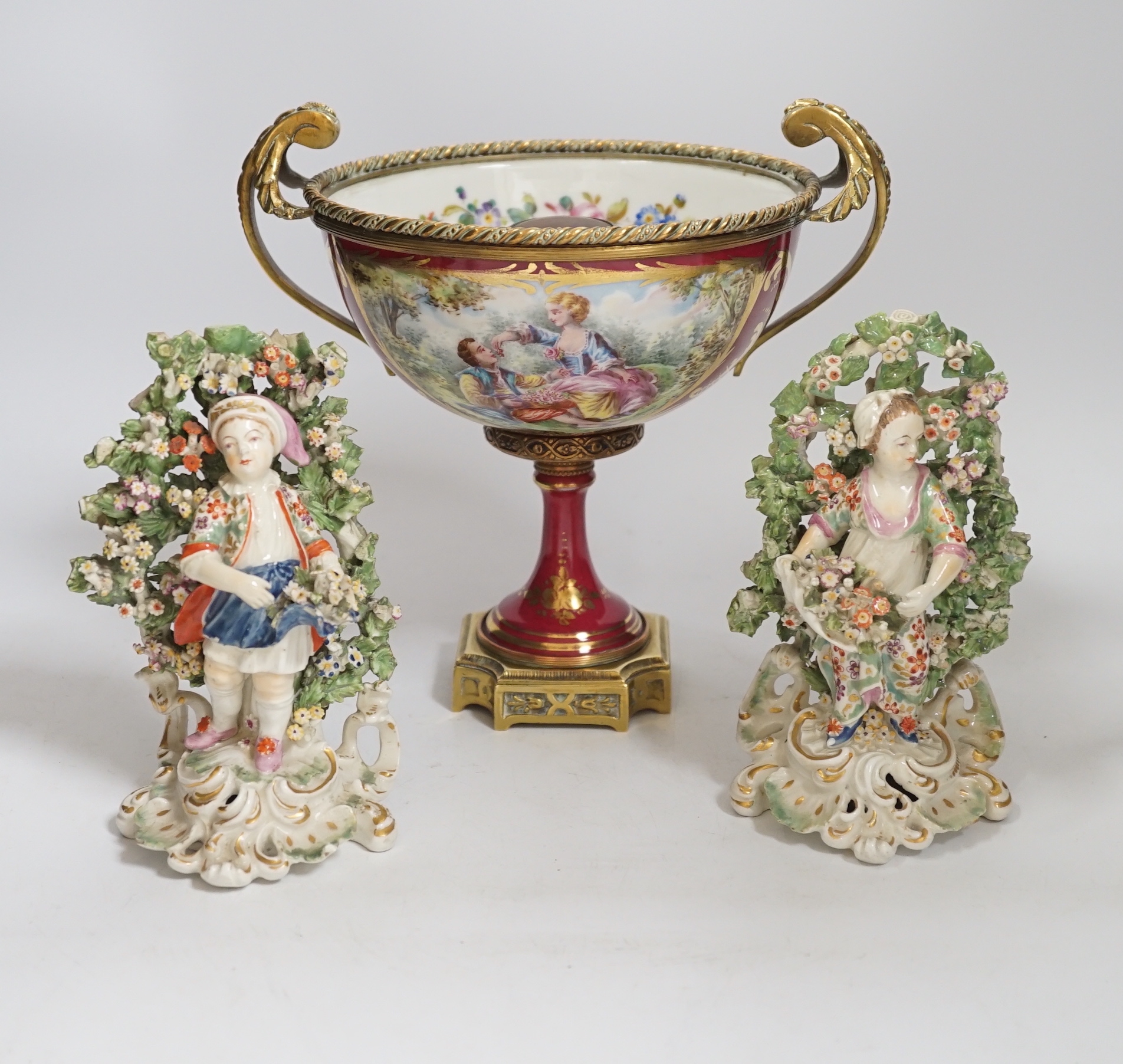 A pair of Derby figures, c.1775, a Paris porcelain gilt metal mounted comport and a glass jar, 21cm high